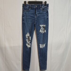 American Eagle Outfitters Next Level Stretch Distressed Skinny Jeans.